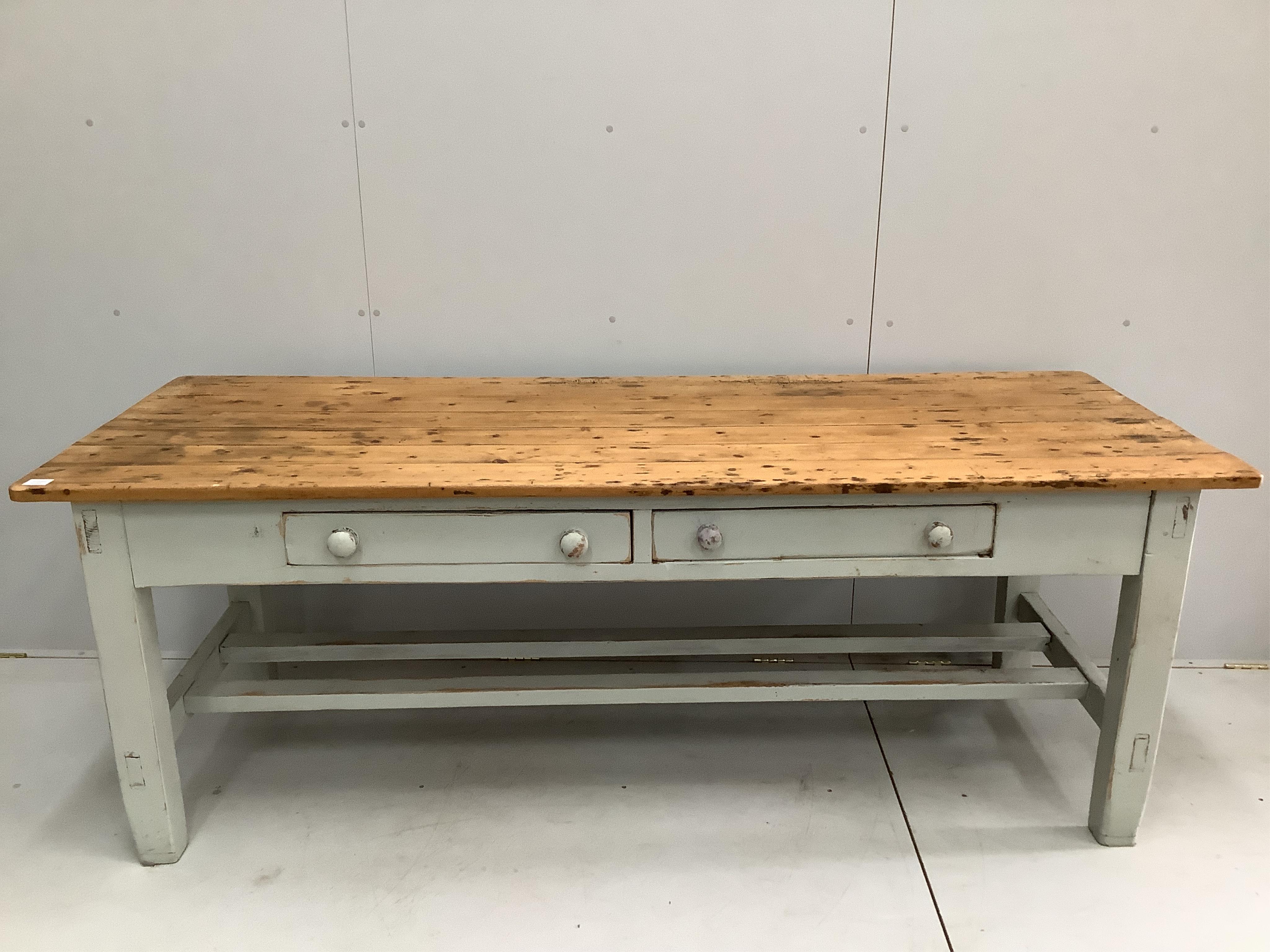 A 19th century part painted two drawer pine kitchen table, width 214cm, depth 82cm, height 78cm